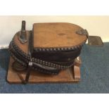 A pair of unusual leather and oak mounted bellows