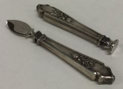 An unusual Continental silver oyster shucking set