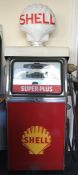 A rare and unusual full size Shell petrol pump dec