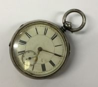 A silver open face large pocket watch decorated wi