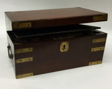 A good quality mahogany and brass mounted writing