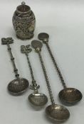 A set of four unusual silver souvenir spoons toget