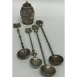 A set of four unusual silver souvenir spoons toget