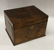 A burr walnut and brass mounted jewellery box with