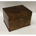 A burr walnut and brass mounted jewellery box with