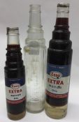 Three "Esso Extra Motor Oil" bottles. (3).