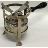 An unusual Continental silver kettle burner on thr