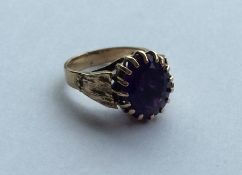 A good amethyst single stone ring in claw mount. A