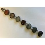 An unusual silver and multi agate bracelet with co