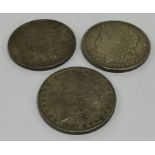 Three USA $1 silver Crowns. Est. £30 - £50.