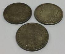 Three USA $1 silver Crowns. Est. £30 - £50.