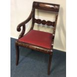 A Dutch marquetry carver chair with slip-in seat.