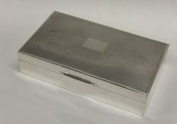 A good quality silver engine turned cigarette box