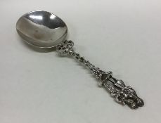 A good Dutch cast silver spoon decorated with figu