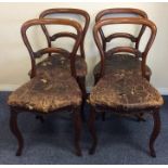 A set of four Victorian mahogany hoop back chairs