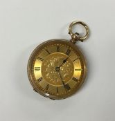 A lady's 18 carat fob watch with loop top and gilt