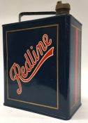 A "Redline" fuel can. (1).