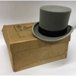 A boxed top hat by Scott & Co. Size 7. Est. £20 -