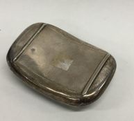 An oval hinged top tobacco pouch with silver gilt