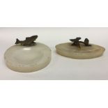 Two onyx and cast bronze ashtrays mounted with Kin