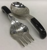 A pair of Continental silver salad servers decorat