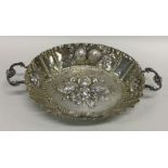 A Continental silver sweet dish, the body embossed