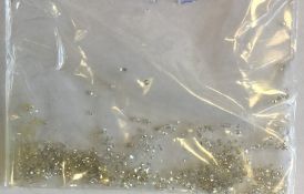 A bag containing numerous diamond chips. Approx. 5