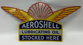 A winged shaped "Aeroshell Lubricating Oil Stocked