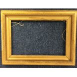 A large gilt picture frame. Approx. 56 cms x 76 cm