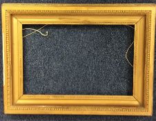 A large gilt picture frame. Approx. 56 cms x 76 cm