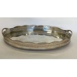 A large oval EPNS gallery tray with pierced sides.