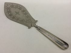 A Georgian bright cut fish slice with tapering sil