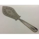 A Georgian bright cut fish slice with tapering sil
