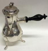 An early Georgian French(?) silver coffee pot on t