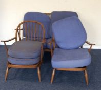 An Ercol three piece settee suite. Est. £60 - £80.