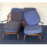 An Ercol three piece settee suite. Est. £60 - £80.