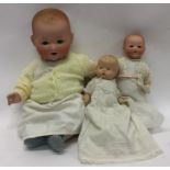 Two porcelain headed German dolls together with on