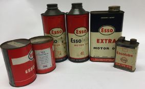 Six various "Esso" oil cans.