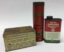 A "Perm-A-Grip Permanence and Safety" tin together