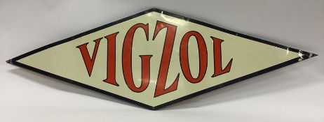 A kite shaped "Vigzol" metal sign mounted on board