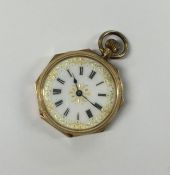 A lady's 14 carat slim fob watch with enamel decor
