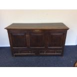 A large oak two drawer hinged top mule chest. Est.
