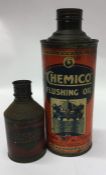 A cylindrical "Chemico Flushing Oil" can together