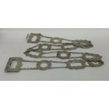 An unusual silver belt with chain link design. Bir