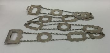 An unusual silver belt with chain link design. Bir