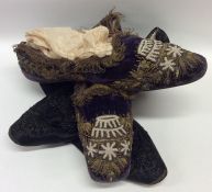 A pair of 19th Century silk court shoes with bead