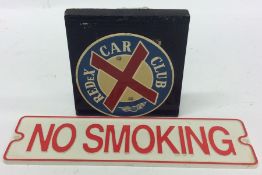 A small circular "Redex Car Club" metal badge moun