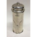 A stylish silver caster with fluted sides. Sheffie