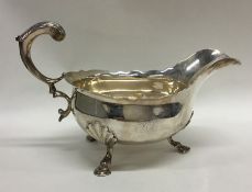 An early Georgian silver sauce boat with card cut