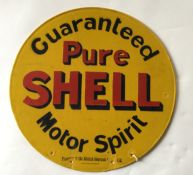 A circular "Guaranteed Pure Shell Motor Spirit" do